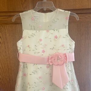 Floral embroidered dress with sequins and pink belt